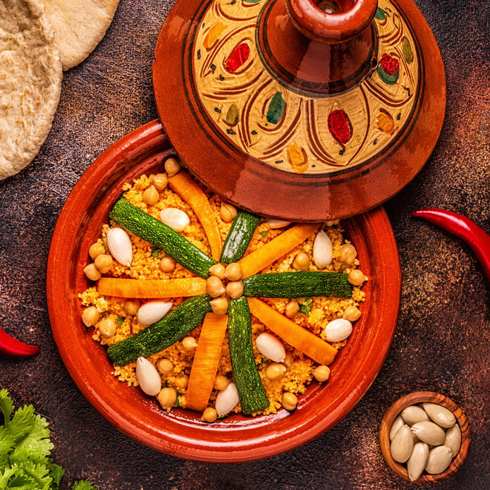 Vegetable tagine with almond and chickpea couscousm