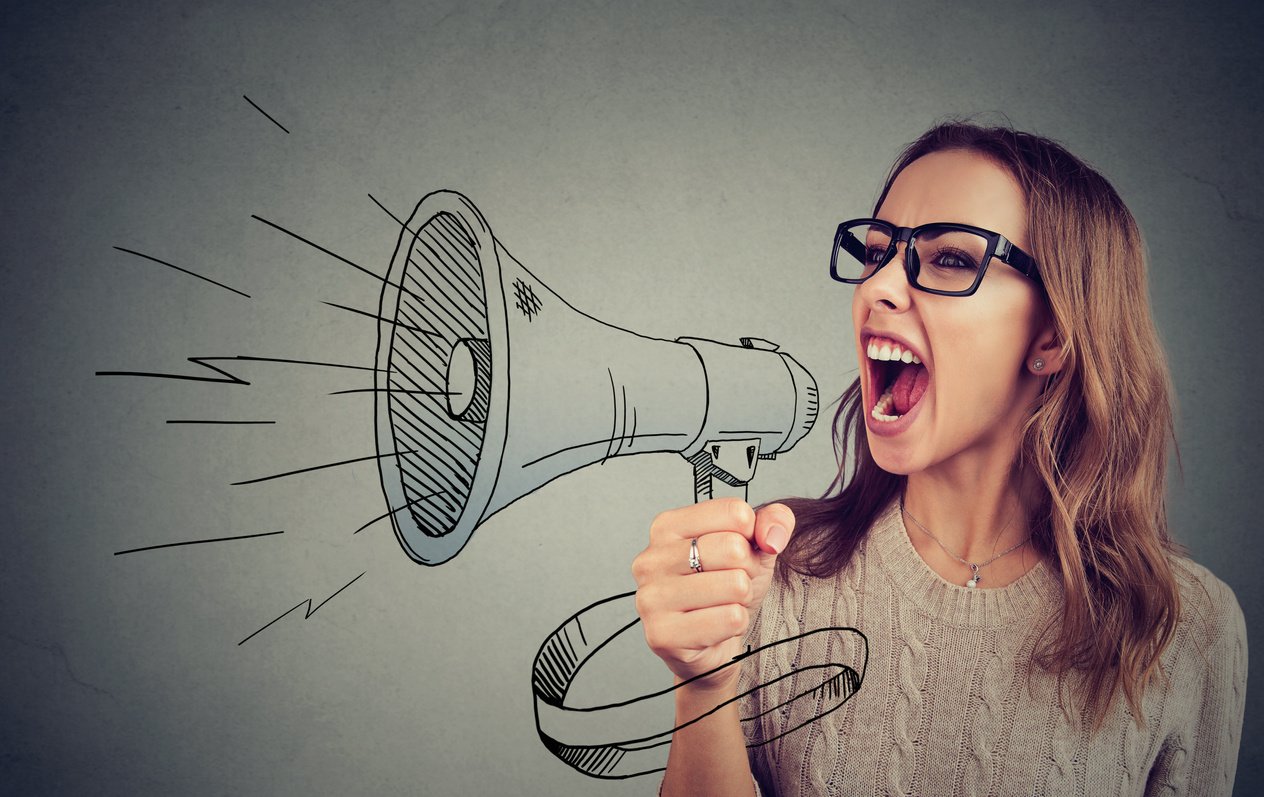 Woman shouting in megaphone